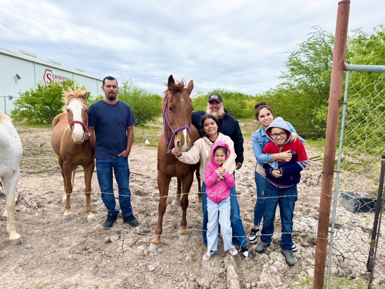 Family Posing with Horses